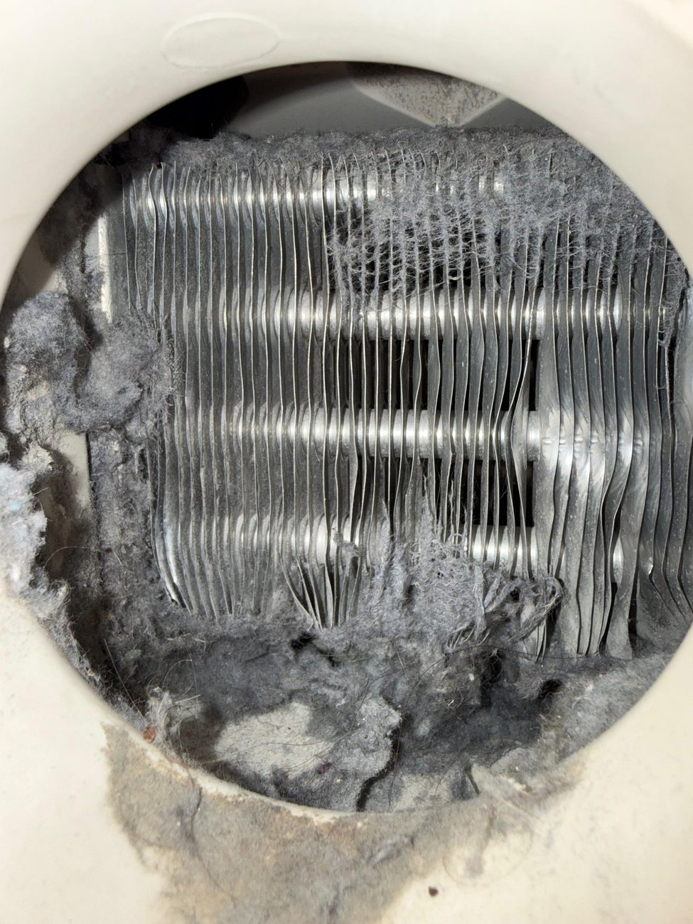 Dryer lint buildup near heating element
