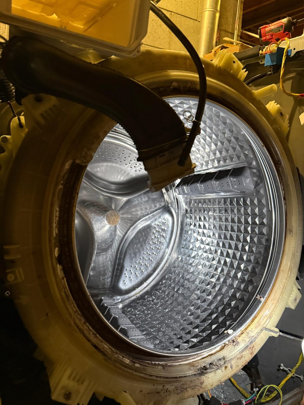 Front load washer tub opened