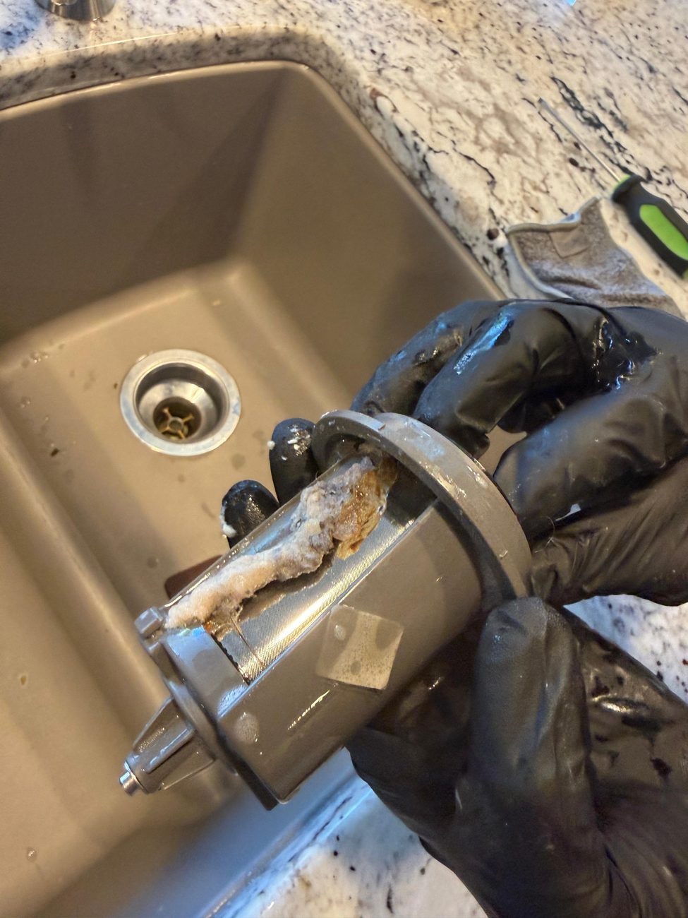 Drain filter being cleaned